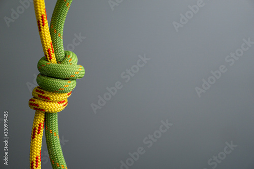 double fisherman bend knot yellow green climbing rope