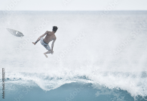 Surfing wipeout in Bali