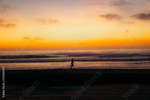 Running at Sunset on Beach