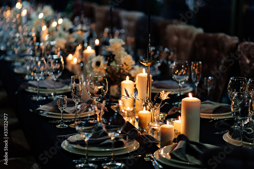 festive table setting candles for wedding party