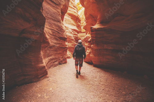 A man walking in canyon back to the camera. Red canyon, Eilat, Israel