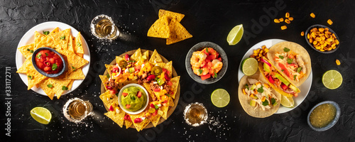 Mexican food panorama, shot from the top on a black background