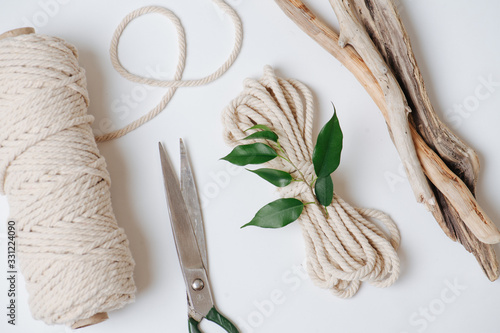 Everything for weaving macrame, rope, scissors and sticks