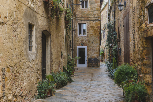 Walk on a rainy day through the streets of the beautiful town, Pienza, Tuscany
