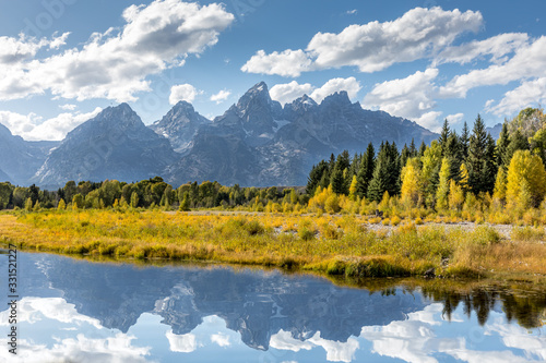 View of the Grand Teton Mountains from Schwabacher Landing on the Snake River. Grand Teton National Park, Wyoming, United States.