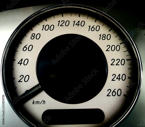 speedometer on black background