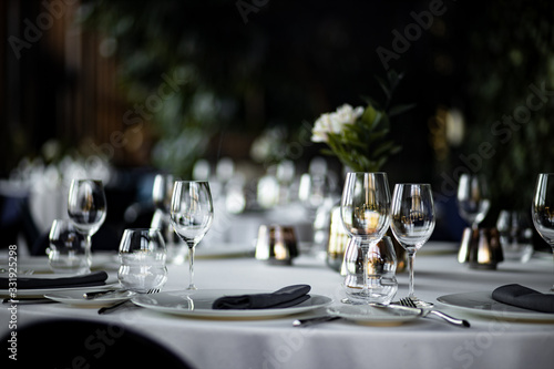 Beautiful table set for an event party or wedding reception . restaurant interior