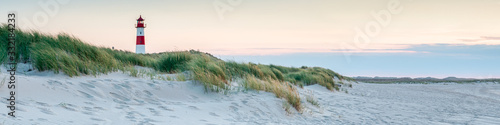 Panoramic view of a lighthouse standing at the coast of Sylt, North Sea, Germany