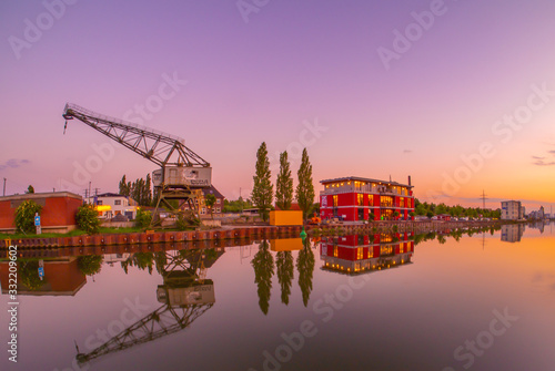 Crane in the port of Hamm Westfalen in the Ruhrgebiet at sunset