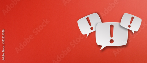 Exclamation mark with speech bubbles on red background