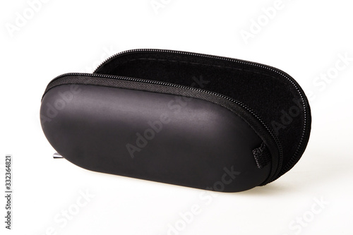 Open black protective sunglasses case on zipper isolated on white background