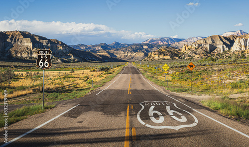 Scenic view of famous Route 66 in classic american mountain scenery at sunset