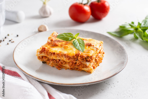 Homemade delicious Meat lasagna with basil leaf on the top. Close up. Recipe, menu. Italian cuisine
