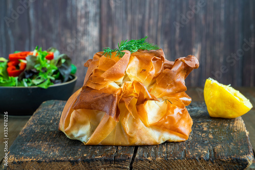 Coulibiac - Russian type of pirog filled with salmon stuffed with rice, mushrooms,onion,dill and hard-boiled egg