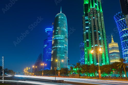 Night urban skyline of modern skyscrapers in Financial District in Doha, Qatar