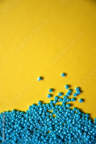 Blue Beads On Yellow Background / Abstract Minimalist Photography / Arts And Crafts Equipment 