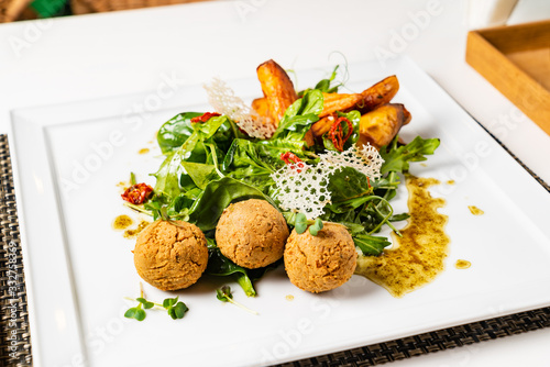 delicious falafel with salad and potatoes