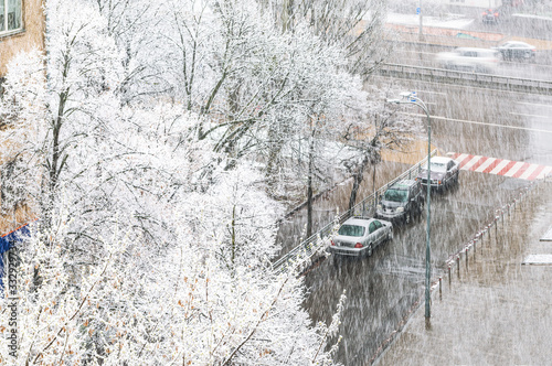 Snowfall in March. Fragment of Kiev, Ukraine.