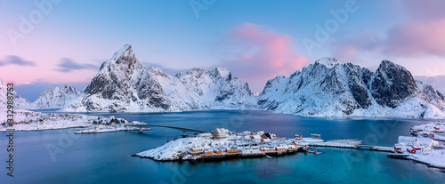 Panoramic view from above to Sakrisøya Island with mountains on background at sunrise - Lofoten Islands, Norway. Europe