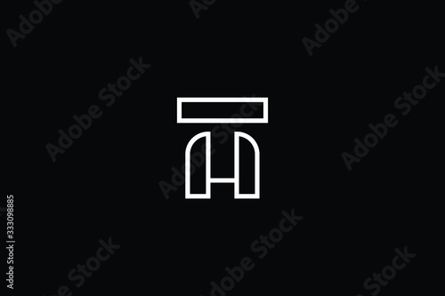 Minimal elegant monogram art logo. Outstanding professional trendy awesome artistic TH HT initial based Alphabet icon logo. Premium Business logo White color on black background