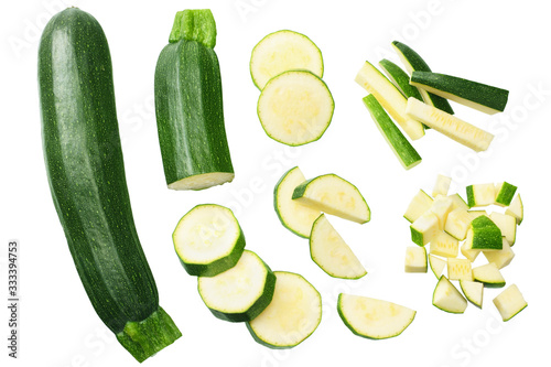 fresh green zucchini slices isolated on white background