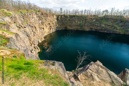 Water filled stone quarry in Brandis, Saxony, Germany