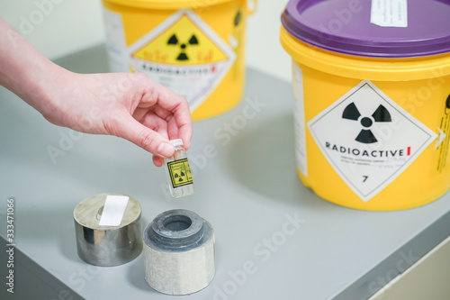 close up hand open lead box of Iodine 131(I-131)Radioactive isotopes used for hyperthyroidism treatment.