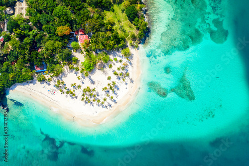 Aerial drone view of beautiful caribbean tropical island Cayo Levantado beach with palms. Bacardi Island, Dominican Republic. Vacation background.