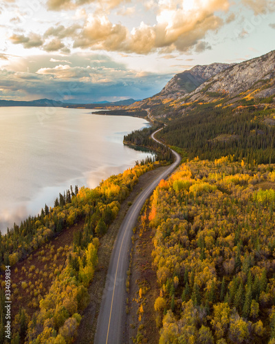 The remarkable, stunning, autumn, fall landscape of Yukon Territory in Northern Canada. Drone, aerial woods, lake shot.