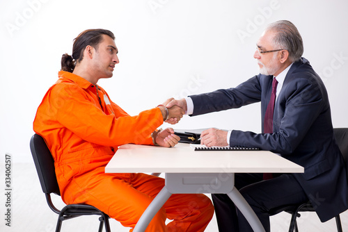 Young captive meeting with advocate in pre-trial detention