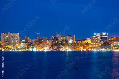 Halifax City skyline at night from Dartmouth waterfront, Nova Scotia NS, Canada.