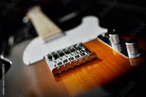 Fender Telecaster electric guitar in two tone sunburst color close-up