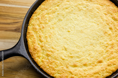 Homemade Southern style cornbread baked in a cast iron skillet. 