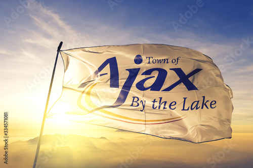 Ajax of Ontario of Canada flag waving on the top sunrise mist fog