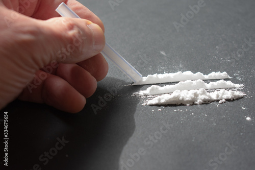 Snorting a line of cocaine