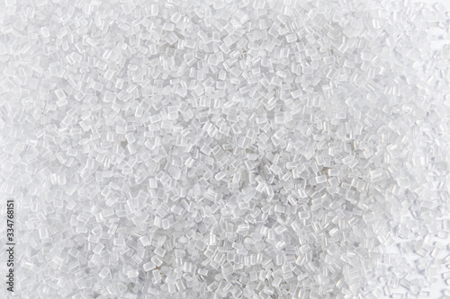 Polypropylene granule close-up background texture. plastic resin ( Masterbatch).Grey chemical granules for industrial plastic production