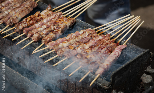 Arrosticini cooked outdoors, Campo Imperatore, Abruzzo, Italy