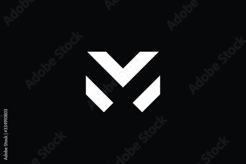 Minimal elegant monogram art logo. Outstanding professional trendy awesome artistic M MX XM initial based Alphabet icon logo. Premium Business logo White color on black background