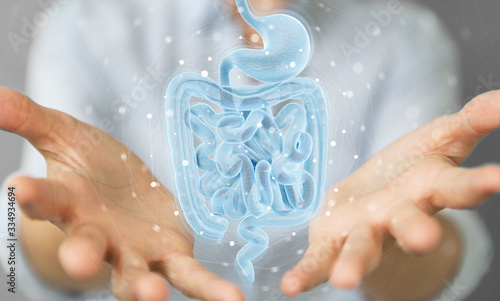 Woman using digital x-ray of human intestine holographic scan projection 3D rendering