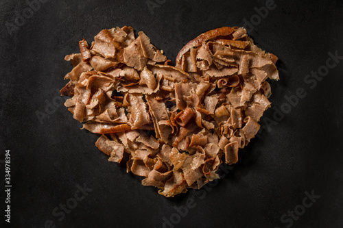 freshly cut juicy kebab meat, arranged in a heart