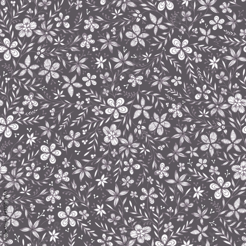 Doodle floral vector seamless pattern. Hand drawn contours of abstract flowers and leaves on gray background. Template for design, textile, wallpaper, clothing, ceramics.