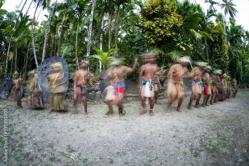 A group of young dancers perform a traditional dance in a village in Yap, Federated States of Micronesia. This beautiful island is known for holding on to its traditional culture.