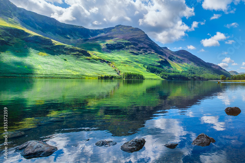 Mountains reflected on a lake at the beautiful Lake District in England