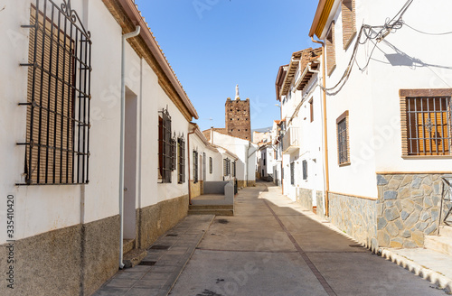 a street in Jerez del Marquesado town with typical white houses, province of Granada, Andalusia, Spain