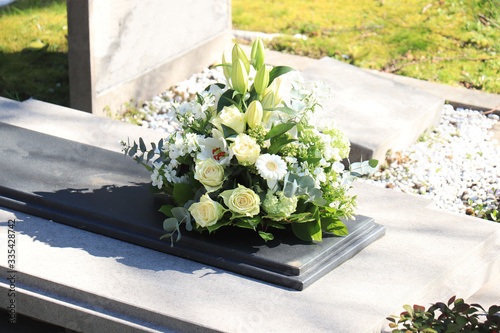 Funeral flowers on a tomb