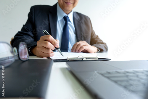 Businessman in the chairman position work