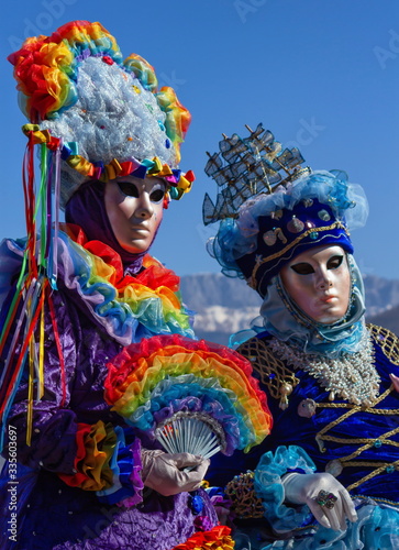 Beautiful and colourful costumes and masks at the Venice Carnival in Annecy by day, France