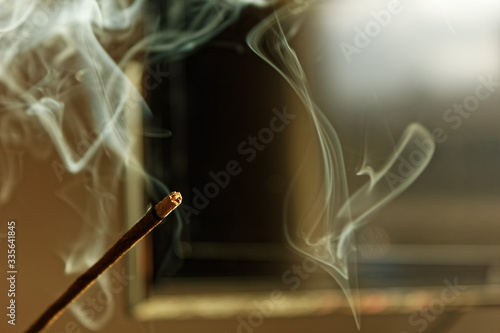 Burning aroma incense stick with smoke. Aromatherapy