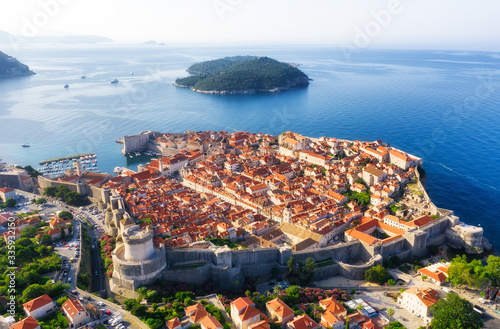 Dudrovnik, Croatia. Aerial view on the old town. Vacation and adventure. Town and sea. Top view from drone at on the old castle and azure sea. Travel - image