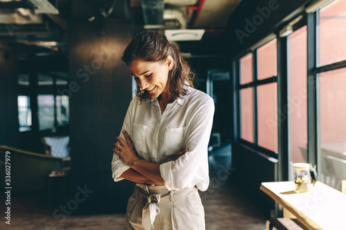 Businesswoman looking happy in office